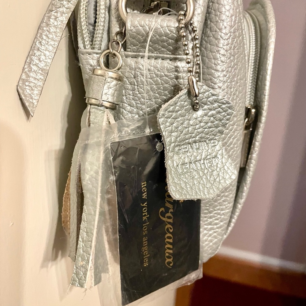 🔥PRICE DROP‼️Brand New With Tags‼️ Silver in color. Shoulder bag. ❤️ - Picture 7 of 9
